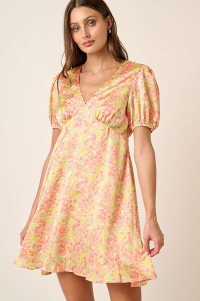 Jade Icarus Mittoshop printed V-neck puff sleeve mini dress for women, featuring floral print and short puffed sleeves.