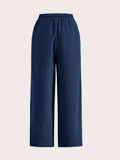 Carmine Juneberry drawstring wide-leg pants, lightweight fabric with relaxed fit and adjustable waist for casual style.