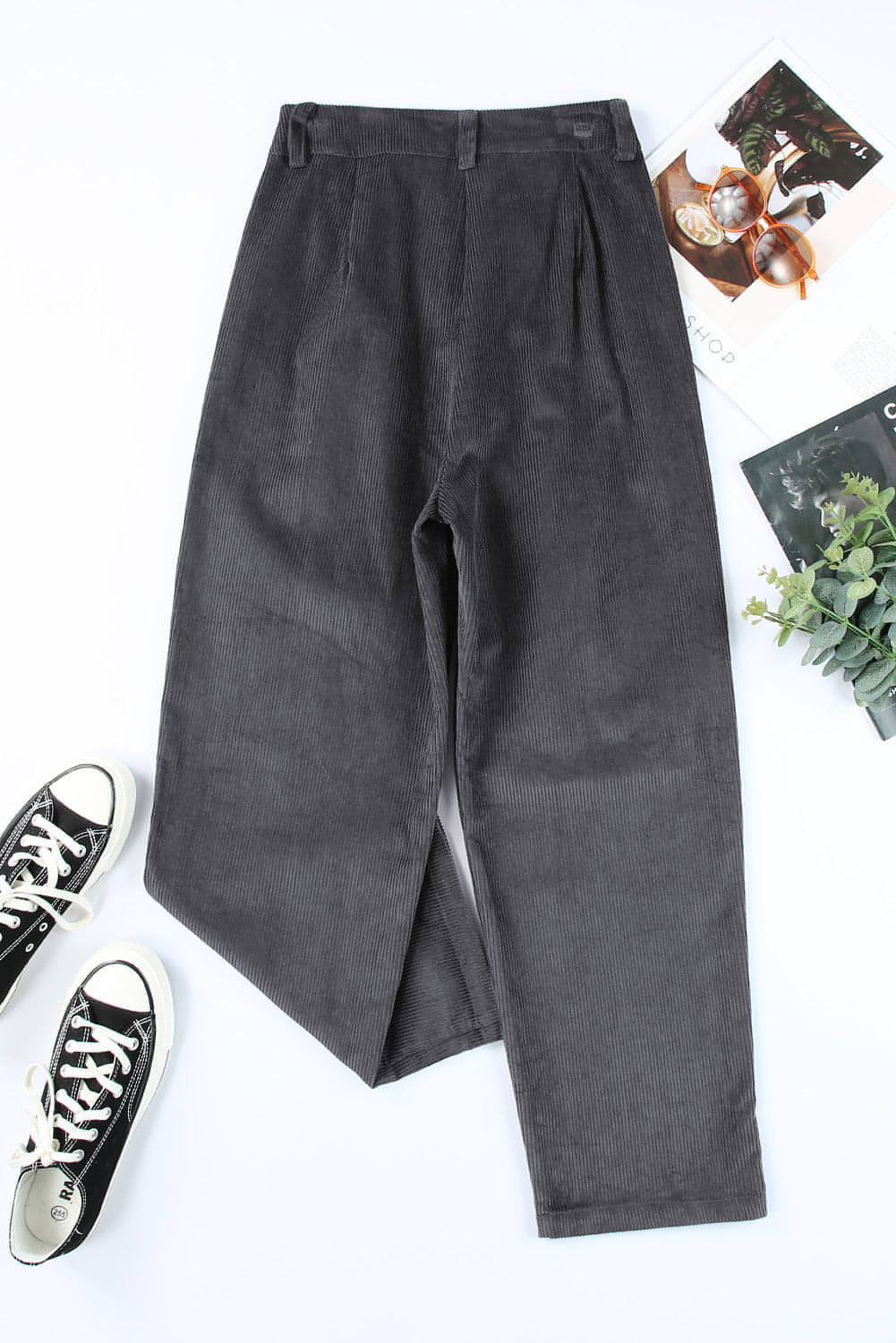 Gray corduroy high waist straight leg pants by Carmine Juneberry displayed on a model.