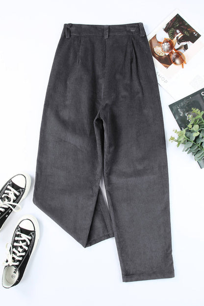 Gray corduroy high waist straight leg pants by Carmine Juneberry displayed on a model.