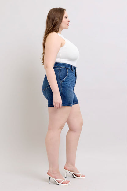 Judy Blue plus size denim shorts with double button waistband, shown in a full size fit, featuring classic blue denim fabric.