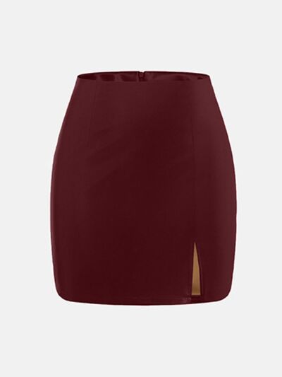 Taupe Oliver MUNSIEUR slit mini skirt with zipper detail, stylish designer skirt for women, shown on a model.