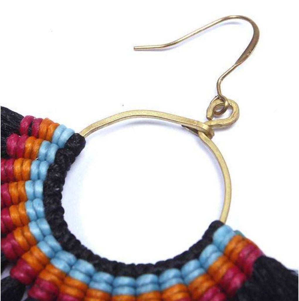 Black tassel earrings by Ariel featuring stylish, handmade fan design with long tassels for a trendy, bohemian look.