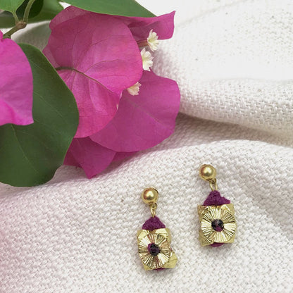 Ariel Keya Flower Earrings featuring intricate floral design, handcrafted fair-trade earrings made from lightweight metal with detailed petal motifs.