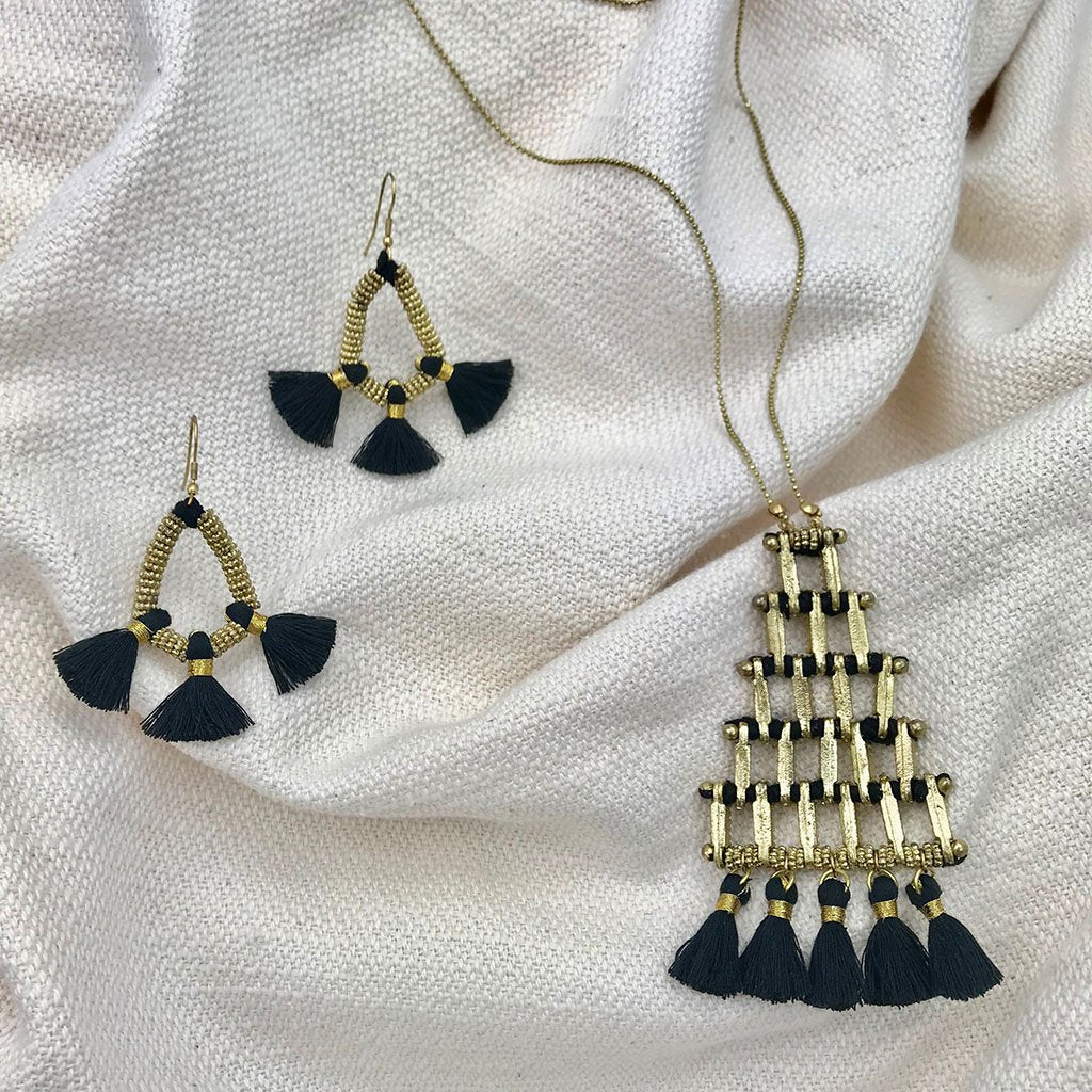 Handmade Kai Pyramid Necklace by Ariel featuring a geometric pyramid pendant on a delicate chain, crafted in fair-trade jewelry style.
