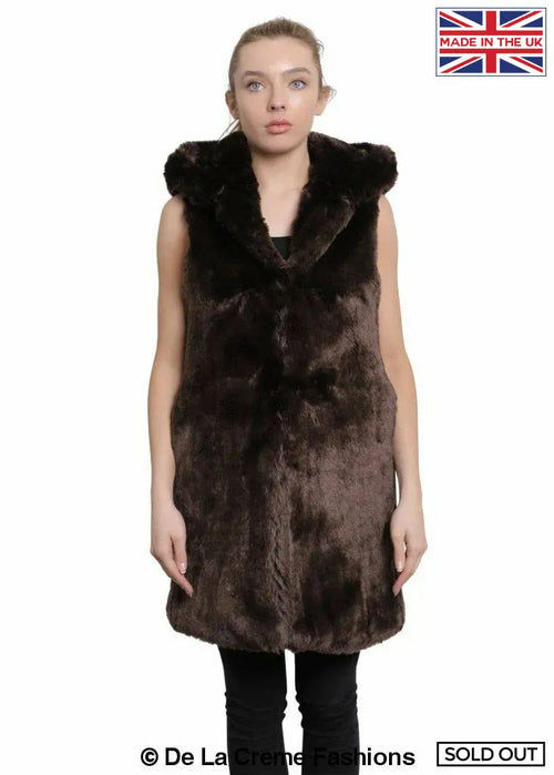 Brown faux fur hooded gilet by Rose Eleusis, stylish jacket with soft fur trim and sleeveless design for layered warmth.