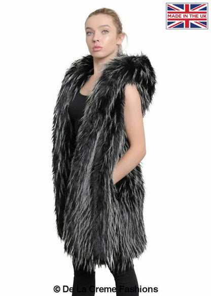 Rose Eleusis faux fur hooded gilet in zebra print, stylish jacket with soft fur hood, perfect for layered winter fashion.