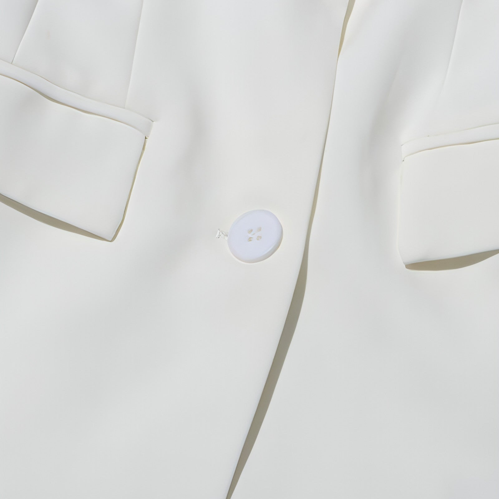 Fashion slim fit patchwork suit jacket for women by Carmine Juneberry, featuring a stylish tailored design and patchwork details.