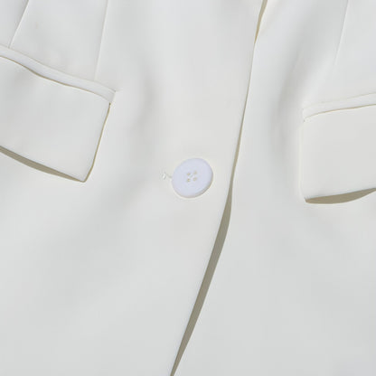 Fashion slim fit patchwork suit jacket for women by Carmine Juneberry, featuring a stylish tailored design and patchwork details.