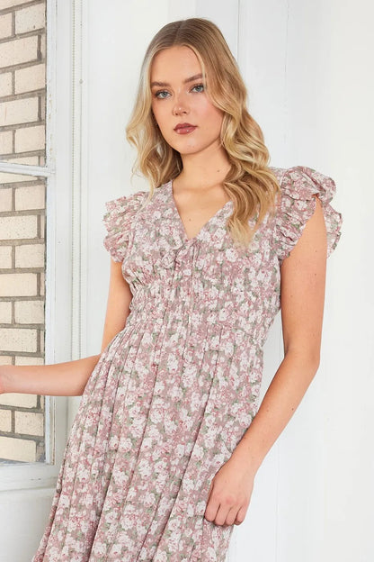 Colorful flower print Mittoshop ruffle cap sleeve V-neck midi dress by Jade Icarus, displayed on a model.