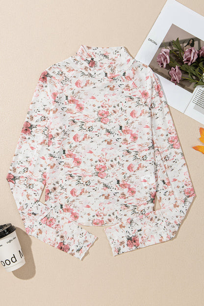 Pink floral long sleeve high neck sheath mesh top by Carmine Juneberry, featuring a fitted design with floral patterns.