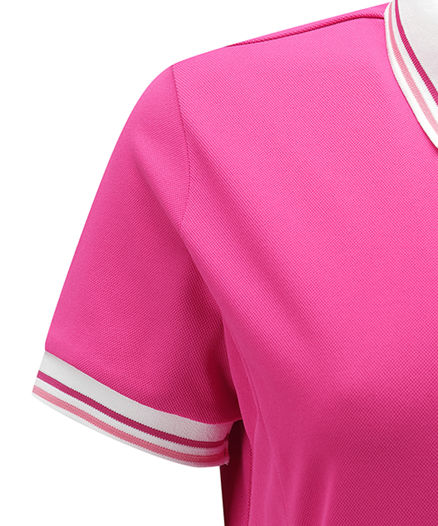 Hot pink ANEW Golf women’s pleated pique skirt dress by Amethyst Lucy, showcasing the stylish golf-inspired design.