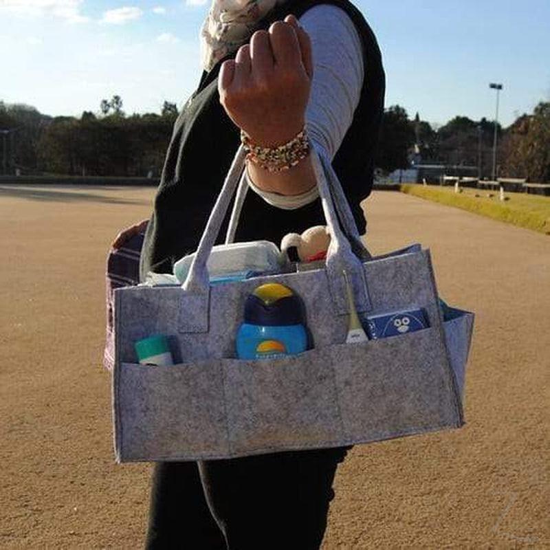 Grey felt nappy organizer caddy with multiple compartments for changing essentials, by Raspberry Pallas