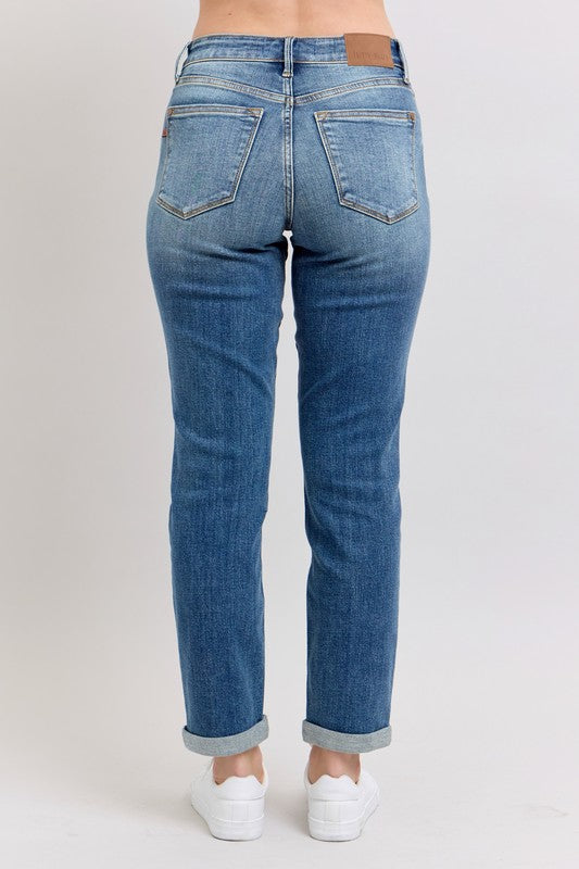 Judy Blue plus size full-length mid-rise skinny cuff jeans with pockets, featuring a comfortable fit and classic denim style.