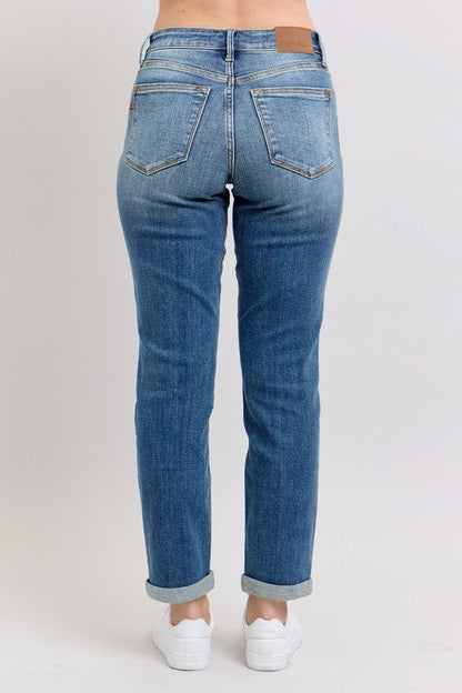 Judy Blue plus size full-length mid-rise skinny cuff jeans with pockets, featuring a comfortable fit and classic denim style.