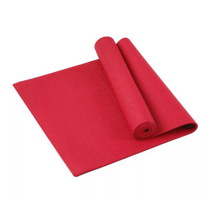 Black Lavender JupiterGear Performance Yoga Mat with carrying straps laid out on a wooden floor. Equipment and accessories for yoga practice.