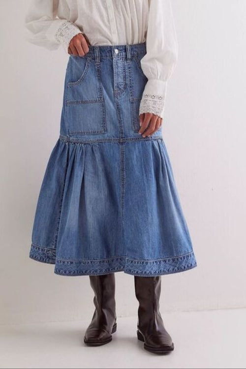 Taupe Oliver MUNSIEUR Bohemian denim midi skirt with flowy fabric and pockets, styled with a casual T-shirt.