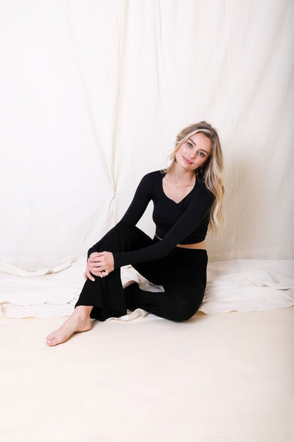 Periwinkle Aether flared lounge pants from the Leto Collection, showing soft, comfortable fabric and stylish wide-leg fit.