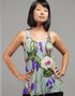 Scorpius floral garden women’s performance tank top featuring vibrant sublimation floral design and comfortable fit.