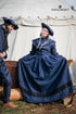 Azure Briseis Landsknecht Skirt Flora Blue and Black, vibrant festival costume with floral patterns and flowing fabric.
