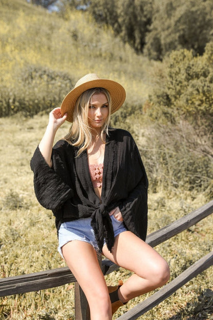 Periwinkle Aether flounce sleeve kimono wrap accessory with flowing fabric and decorative flounced sleeves, stylish and lightweight.