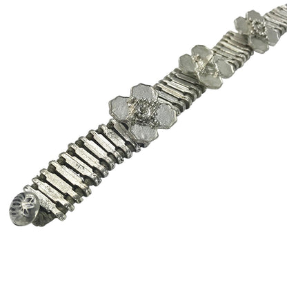 Ariel Kali Flower bracelet featuring vibrant floral design and elegant jewelry craftsmanship.