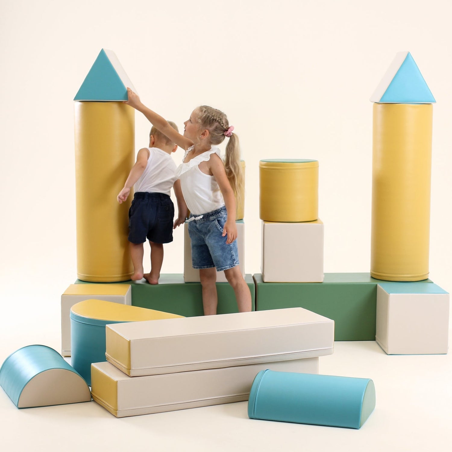 Blush Apricot Mega Fort furniture in fortress blue soft-play material, designed for children&