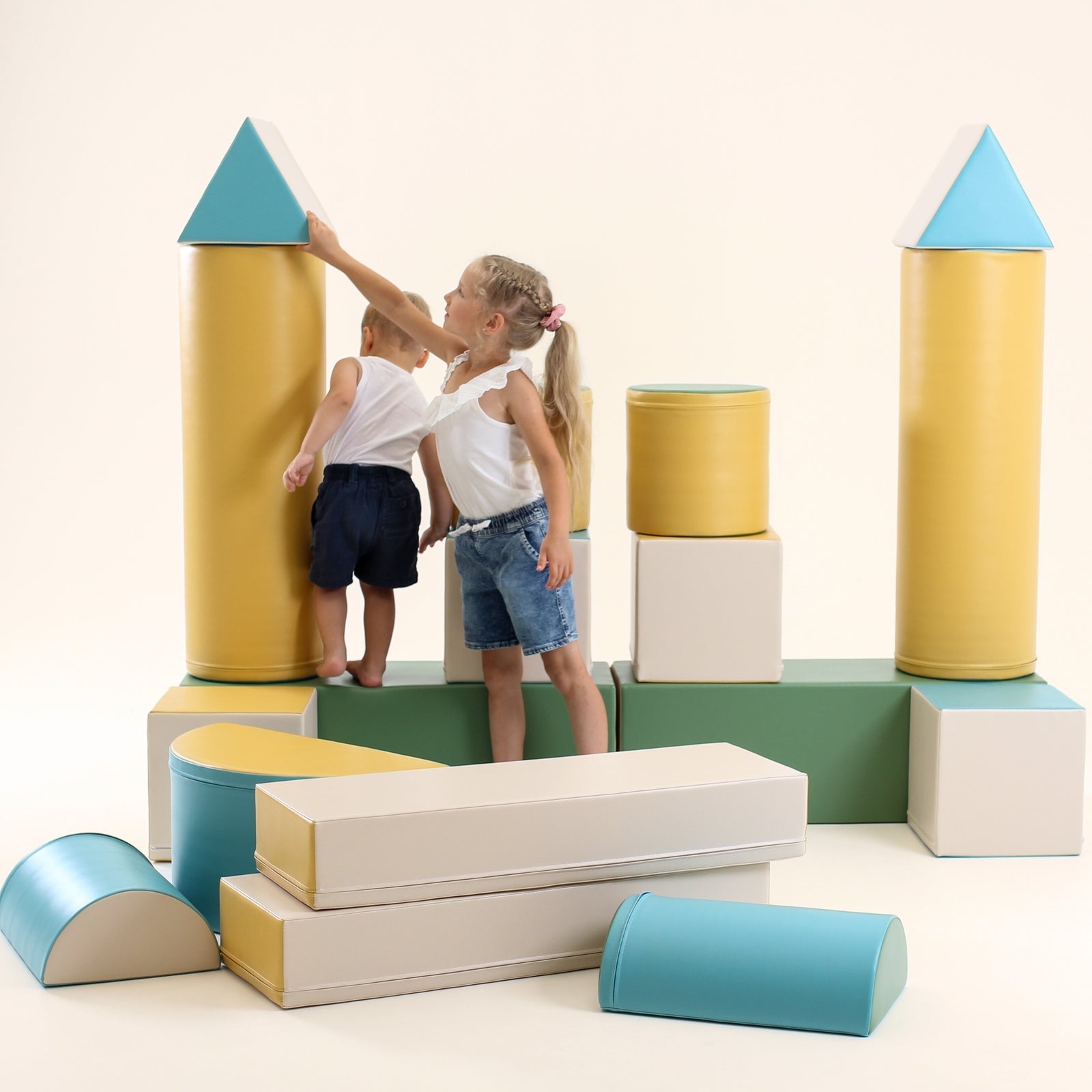 Blush Apricot Mega Fort furniture in fortress blue soft-play material, designed for children&