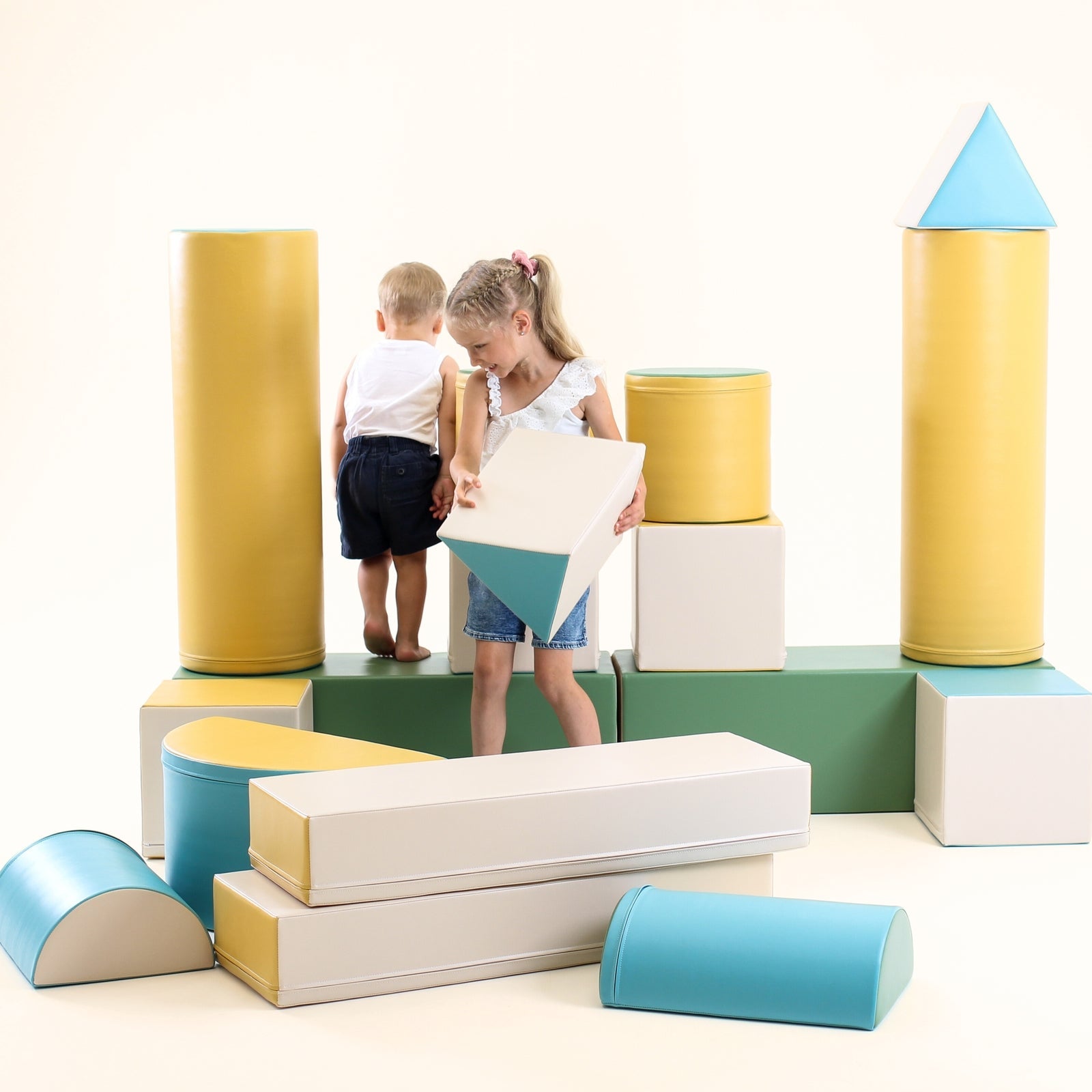 Blush Apricot Mega Fort furniture in fortress-blue soft play, featuring a cozy playhouse with soft, colorful cushions and fabric.