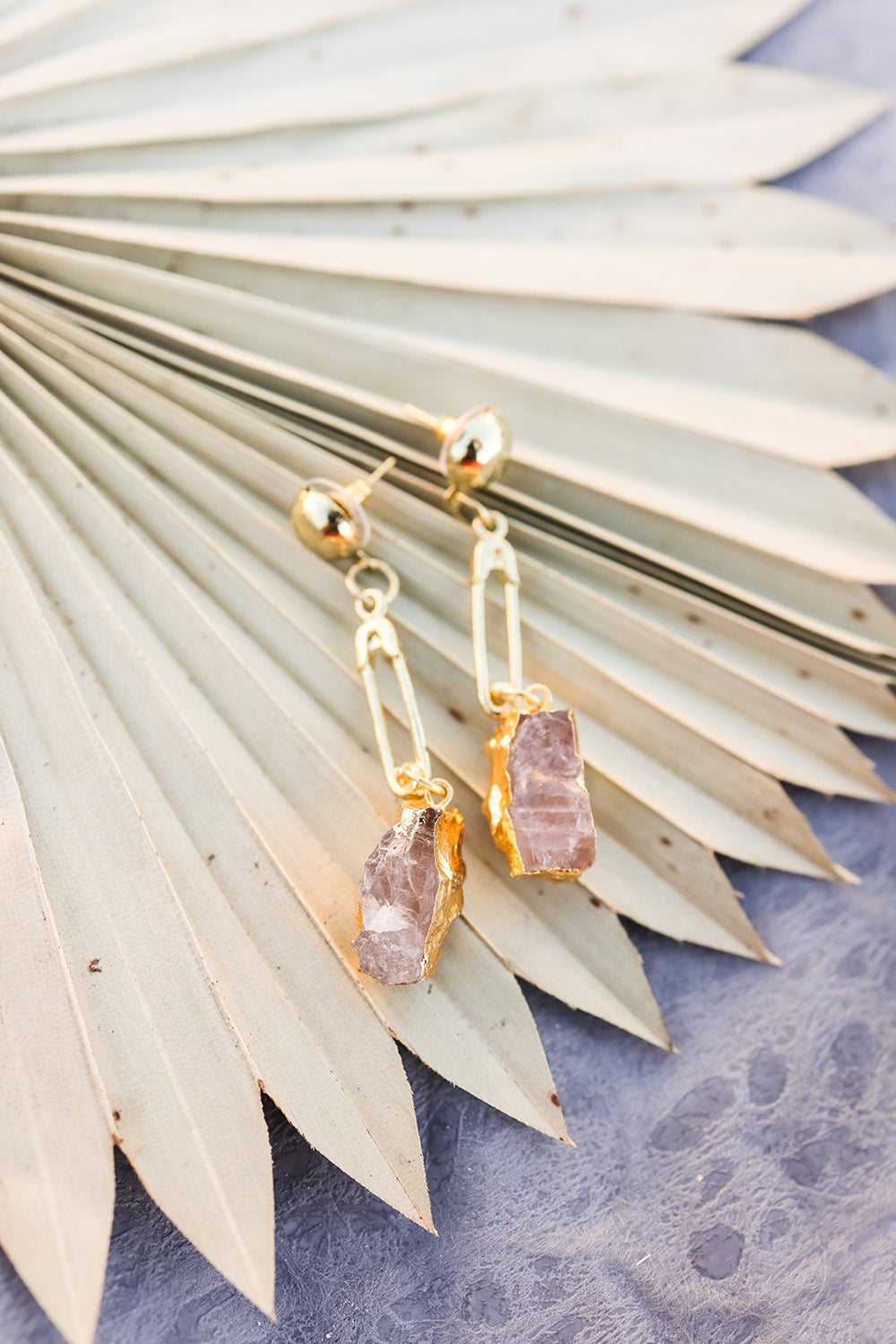 Periwinkle Aether gem stone fashion earrings with colorful, sparkling gemstone accents, stylish accessories for elegant outfits.