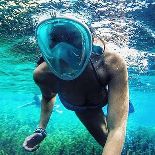 Salmon Lucky full face snorkel mask showing clear view with adjustable straps, designed for comfortable underwater swimming.