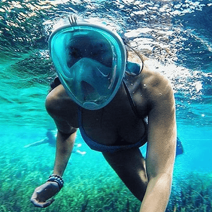 Salmon Lucky full face snorkel mask showing clear view with adjustable straps, designed for comfortable underwater swimming.