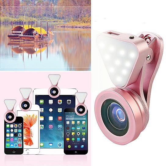 Salmon Lucky Glow Face 3-in-1 photo lens and fill lighting clip, compact tech accessory for enhancing selfies and photos
