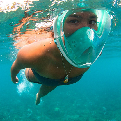 Salmon Lucky full face snorkel mask for outdoors swimming and snorkeling, with adjustable straps and clear lens for outdoor water activities.