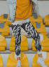 Sky Felix Get Shit Done Legging featuring bold text design, shown laid flat with black fabric and comfortable stretch material.