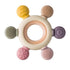 Wooden ring and silicone baby teether by Burgundy Nyx, designed for soothing infants, featuring natural wood and soft silicone textures.