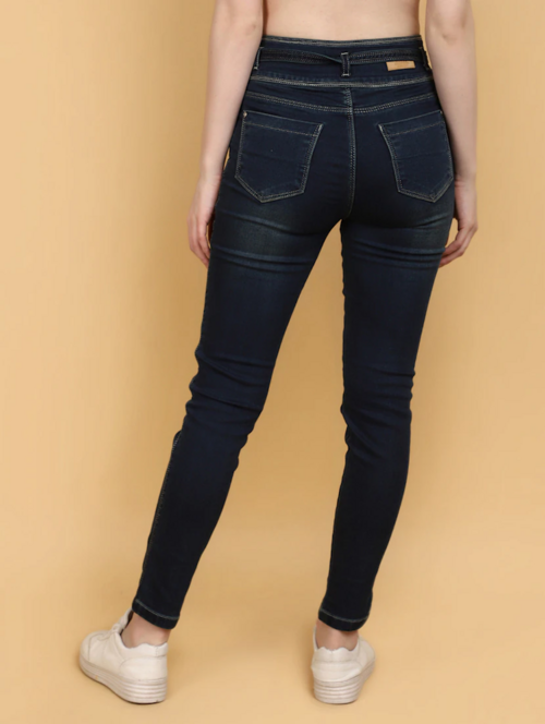 Women’s high rise navy blue denim jeans by Ochre Ourea, size 28, showing the fit and classic denim texture.
