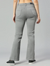 Women’s high rise denim jeans in grey by Ochre Ourea, showcasing the fitted waist and classic denim texture.