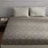 Cotton bedsheet set in taupe and white with 144 TC from Lilac Hercules, displayed in a neatly made bed.