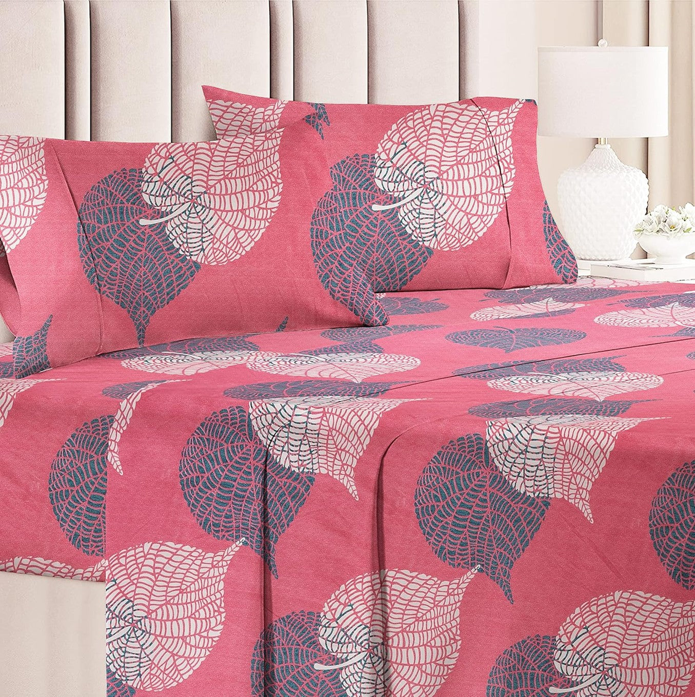 Pink and green microfiber double bedsheet set by Lilac Hercules, featuring soft, smooth fabric for a comfortable bedroom decor.