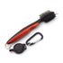 Pear Eucalyptus dual sided golf cleaning brush with textured bristles for cleaning golf clubs and gear in a home and garden setting.