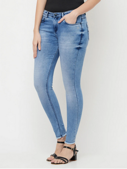 Women’s high-rise blue denim jeans by Ochre Ourea, shown in size 30, featuring classic five-pocket design and fitted silhouette.
