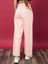 Light pink high rise denim jeans for women by Ochre Ourea, size 28, displayed on a hanger with a close-up of fabric and fit.