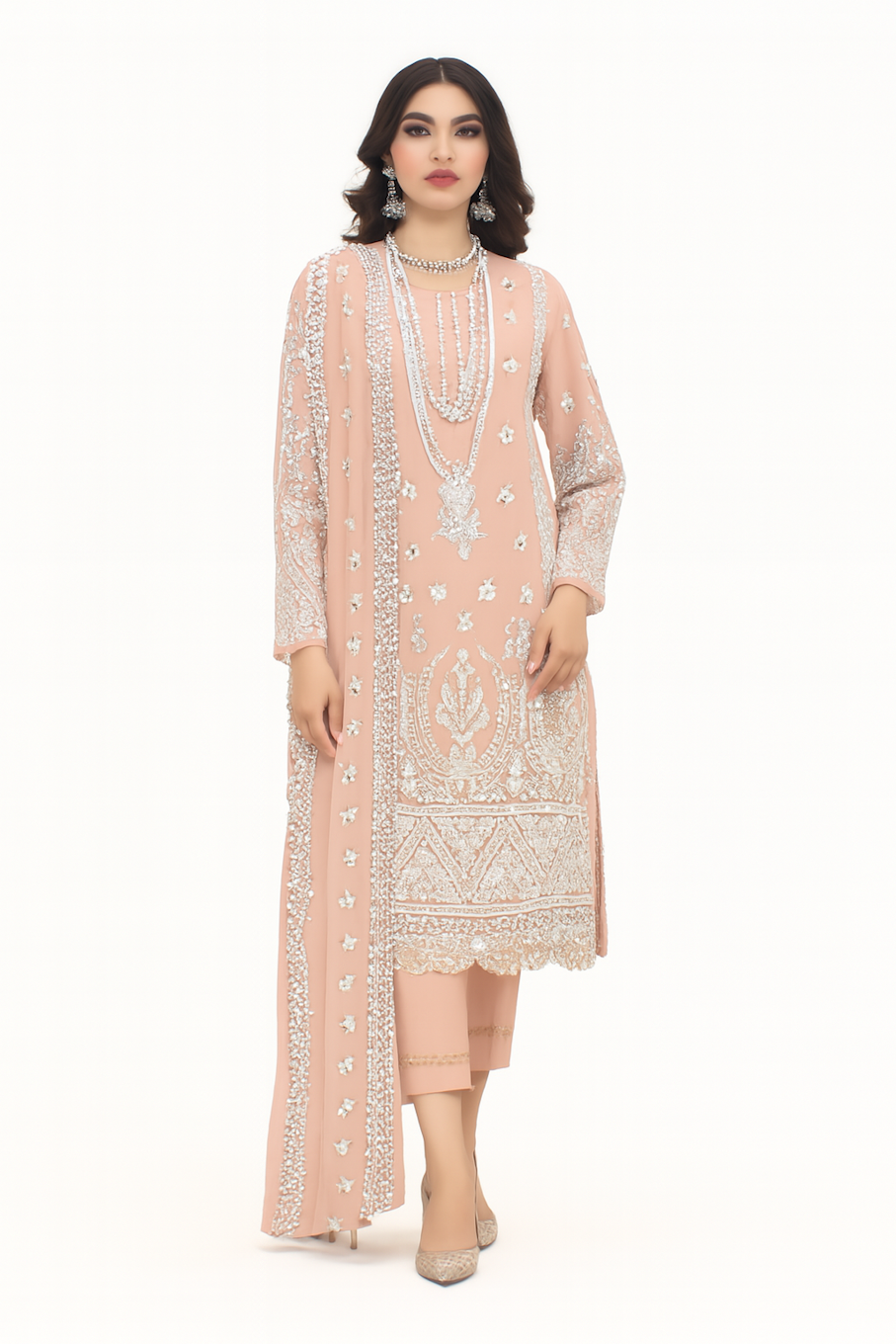 Traditional pink embroidery kurta set for women with intricate design, showcasing vibrant fabric and detailed craftsmanship.