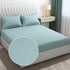 Turquoise microfiber king bedsheet set from Lilac Hercules with matching pillowcases, soft and smooth for a comfortable sleep.