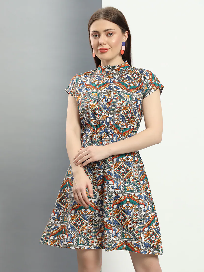 Women’s multi-color printed fit and flare dress by Pear Summer Lilac, shown in size M, featuring vibrant floral pattern and flowing silhouette.