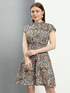 Women’s multi-color printed fit and flare dress by Pear Summer Lilac, shown in size M, featuring vibrant floral pattern and flowing silhouette.