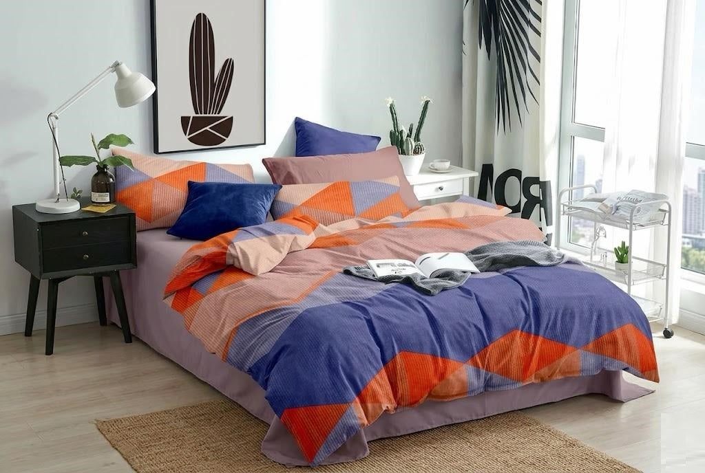 Modern geometric color block bedding set by Violet Achilles, featuring vibrant pattern in a stylish home decor design