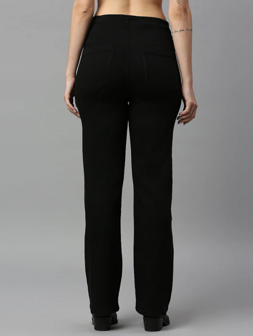 Black women’s high rise denim jeans by Ochre Ourea, size 32, displayed on a model, showcasing a fitted silhouette and classic style.