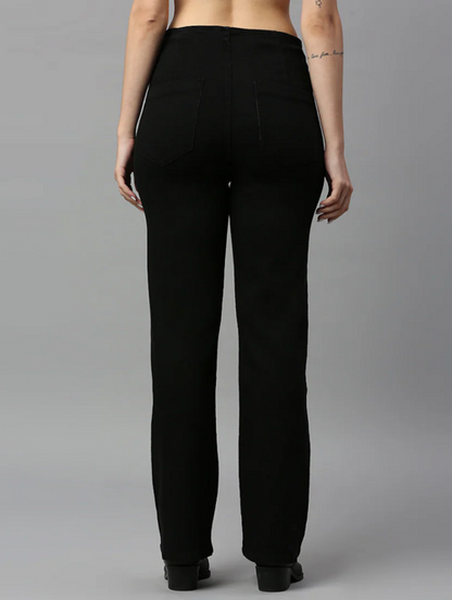 Black women’s high rise denim jeans by Ochre Ourea, size 32, displayed on a model, showcasing a fitted silhouette and classic style.